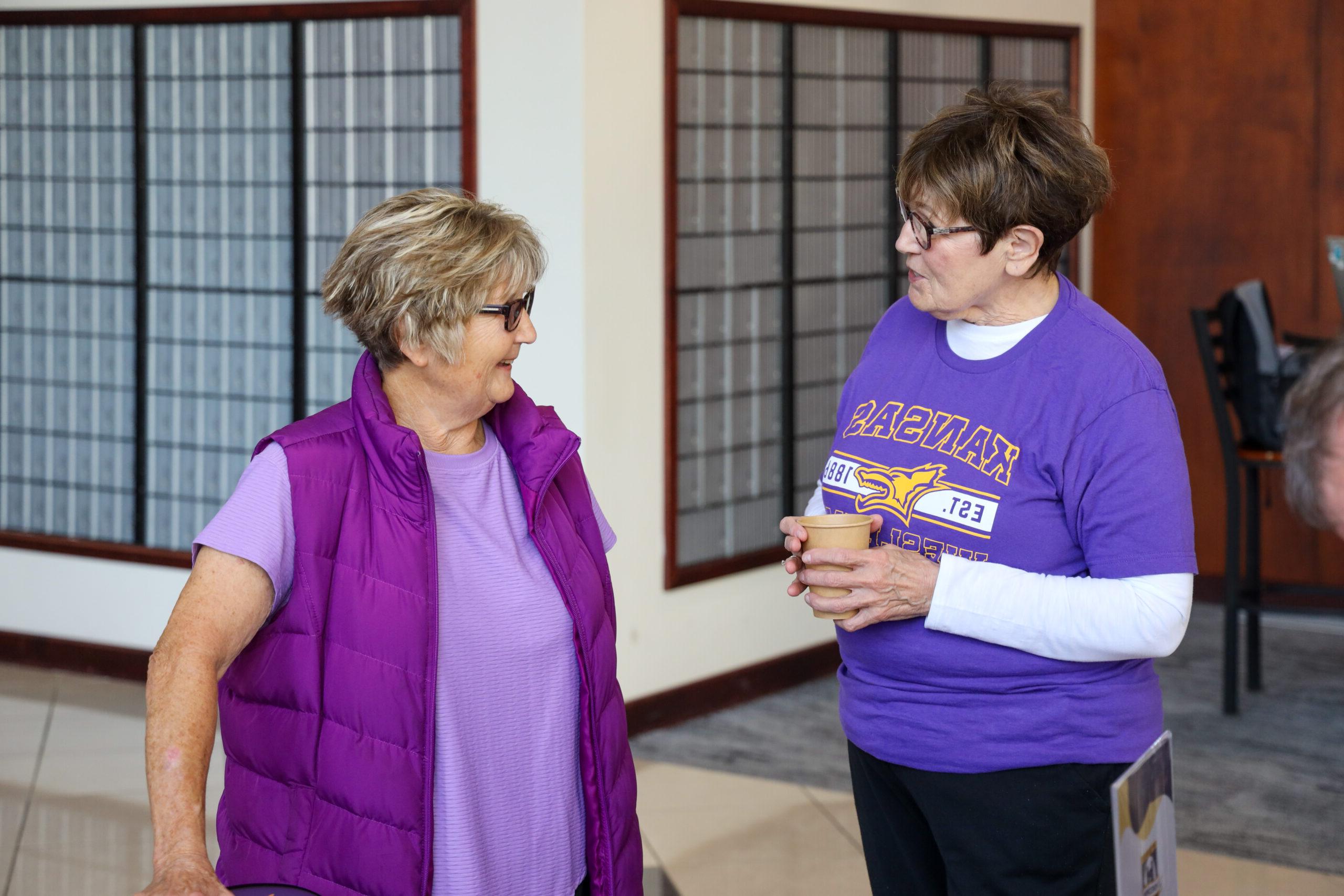 Two women talking in SAC